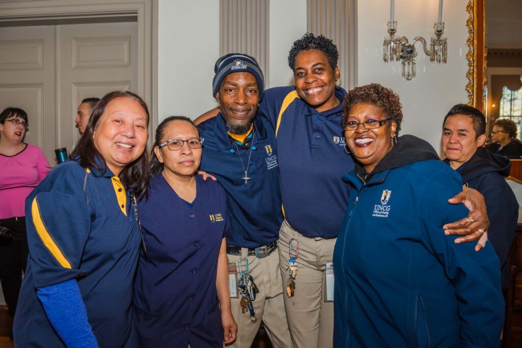 Housekeeping staff gather in the Virginia Dare Room for the Valentine's Day breakfast
