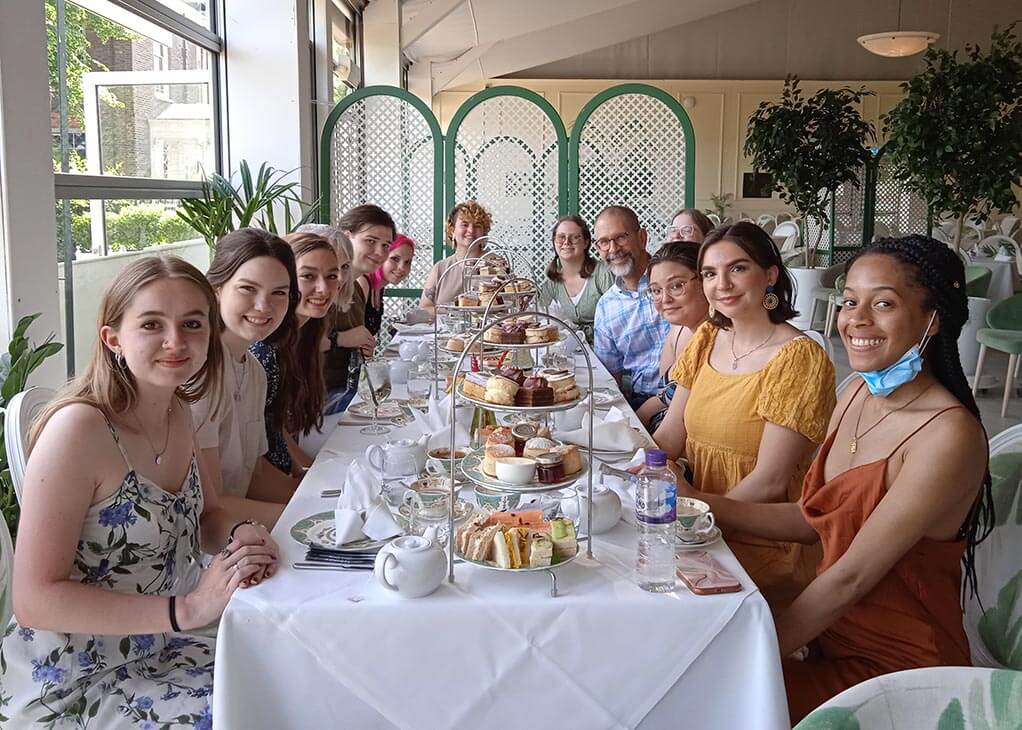 group of people at tea in london