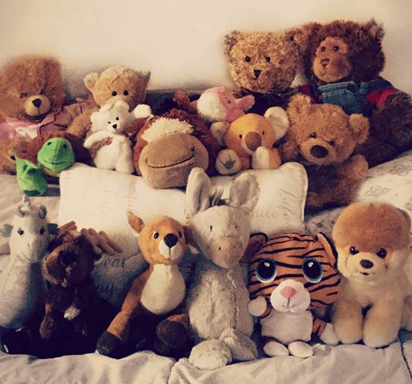 sepia toned image of old stuffed animals