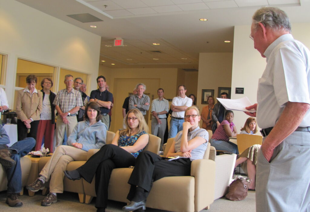 Eason speaking to a group of faculty and students