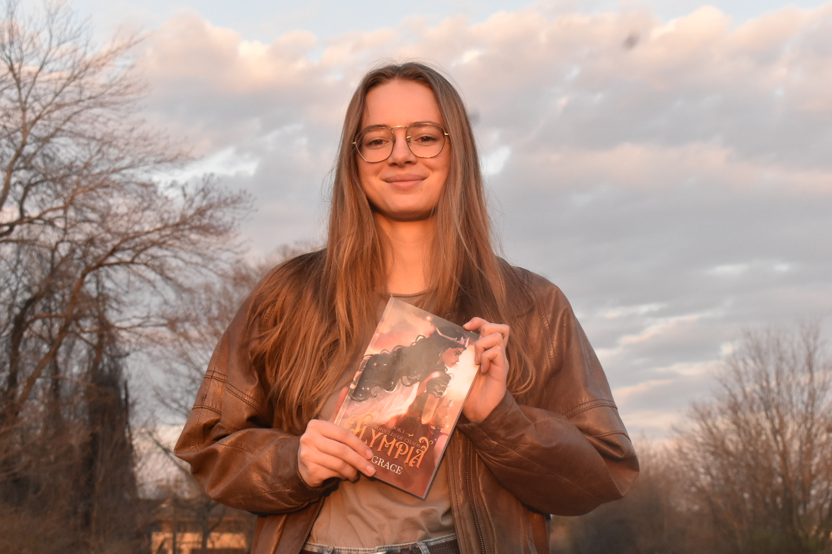 Evangeline Grace Lothian holds her book