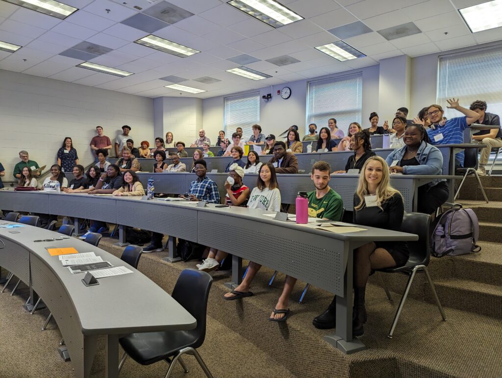 A lecture classroom full of students eager to participate in the UNCG Ethics Bowl. 