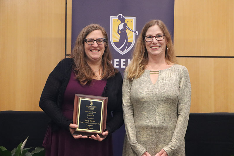 Kelly Taylor, Staff Excellence Award Recipient, with Dean Adamson