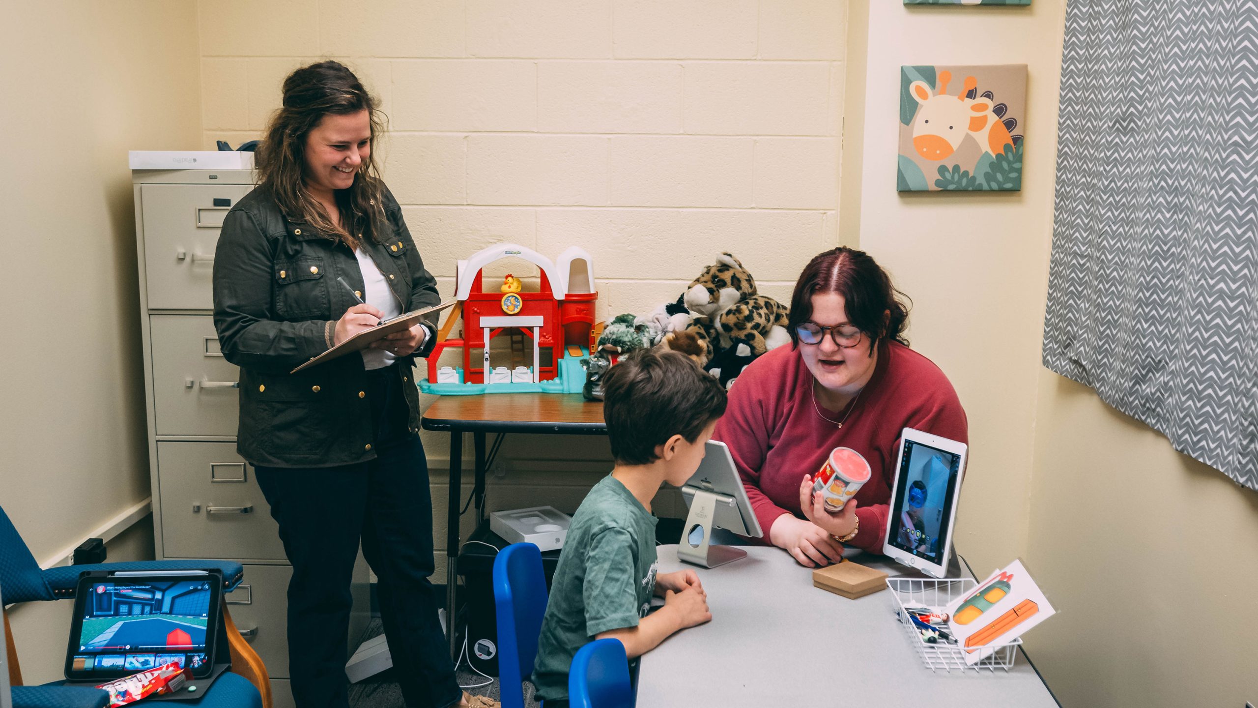 Dr. Jessica Caporaso and undergraduate Clara Lussier conduct research in a Duck Lab testing room.