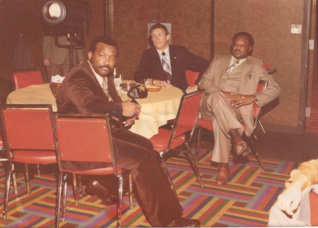 Archival photograph of McDonald's employees seated at a banquet or business event during the early years of their restaurant operations.