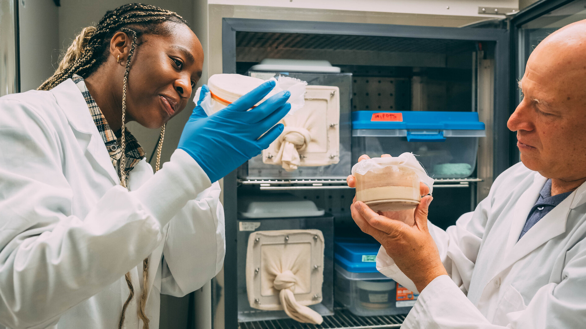 biology instructor and student in the lab.